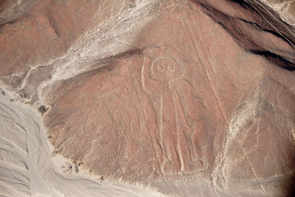 Aerial photograph of the famous Nazca Lines Astronaut geoglyph in Peru.